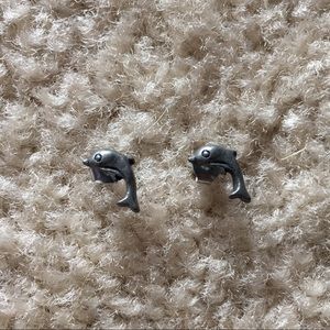 Adorable tiny pewter dolphin earrings.